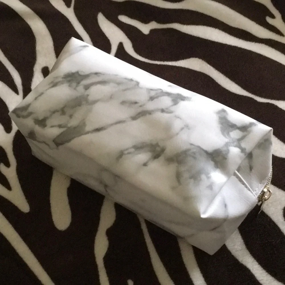 Makeup bag FREE with purchase